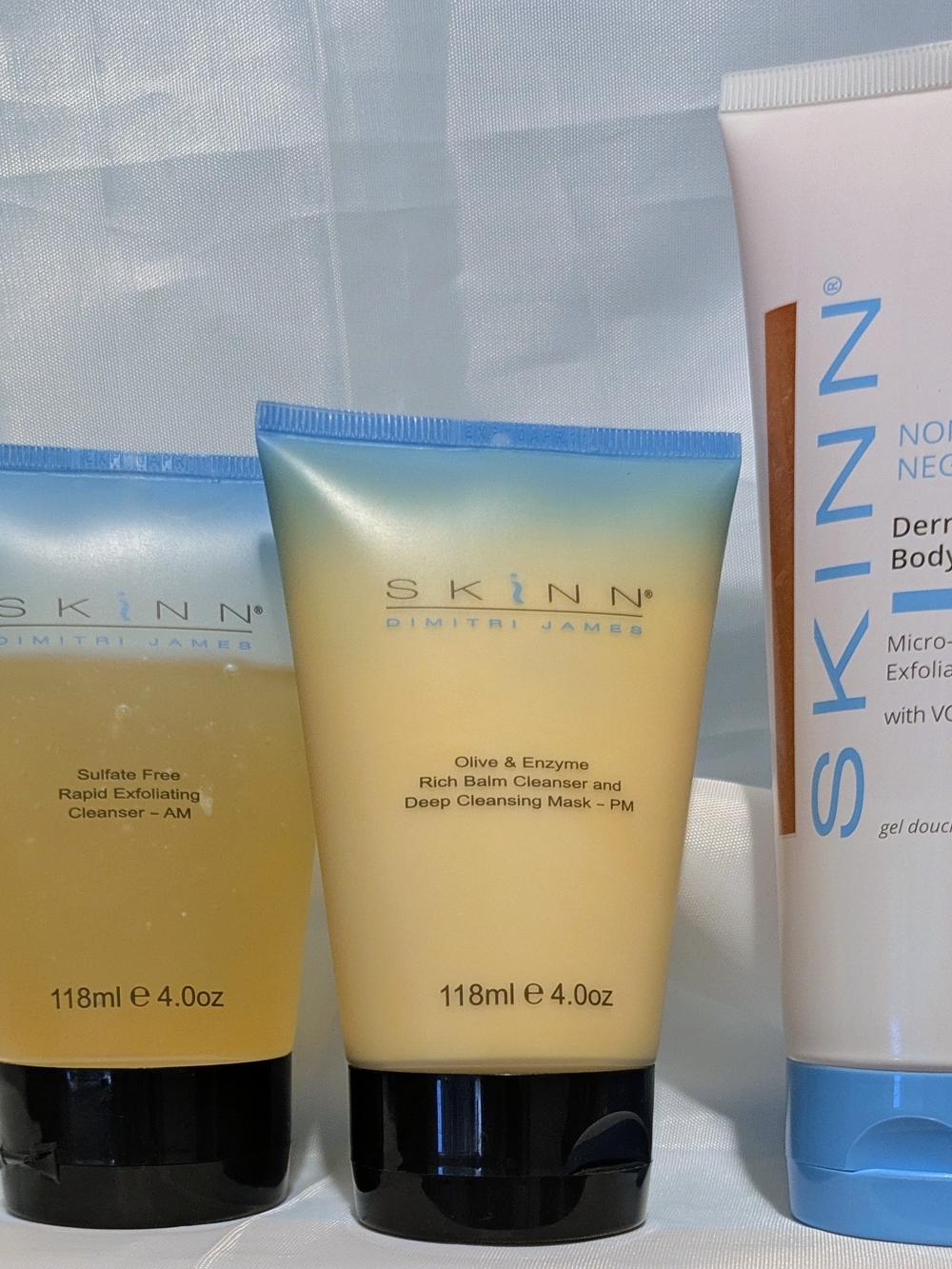 SKINN BUNDLE 4oz AM/PM Facial Duo Plus 6.5 oz Exfoliating Shower Gel